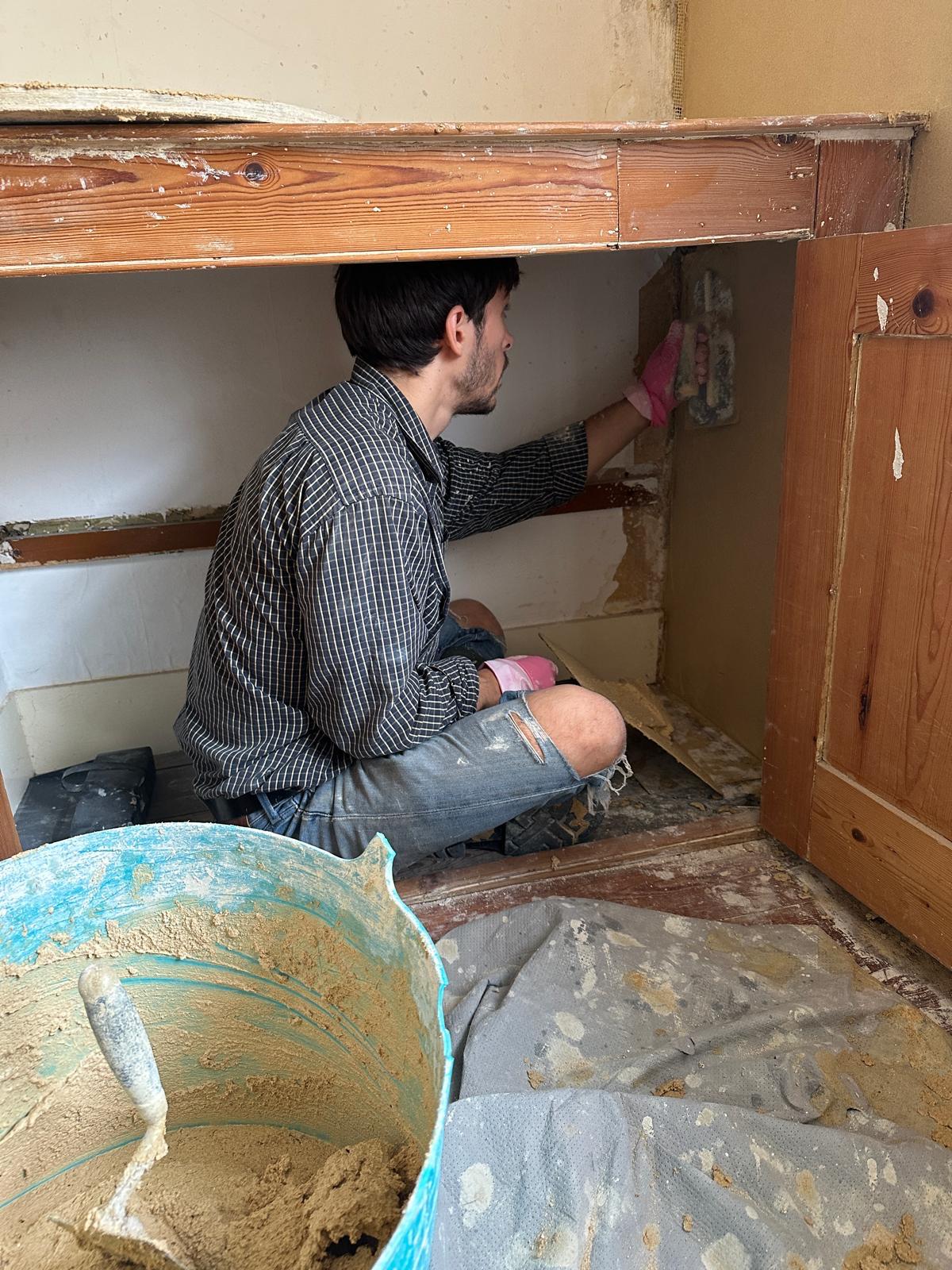 Conservation plastering cupboard